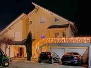 Ansicht Haus mit Garage