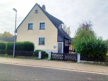 Ansicht von der Straße - Haus kaufen in Bad Kreuznach-Ippesheim - Für die junge Familie-Gestaltungsmöglichkeiten-ehrlich-großes Grundstück-ruhig