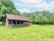 Doppelcarport mit rückwärtiger Überdachung und Sitzgelegenheit mit Ausblick in