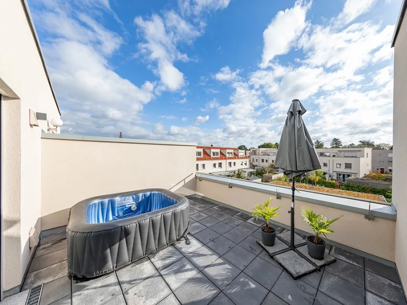 Herrliche Aussicht von der Dachterrasse über die Dächer der Gartenstadt