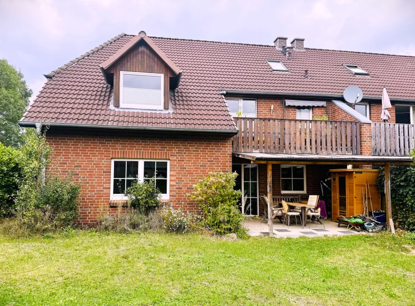  - Wohnung kaufen in Lüneburg - Familienfreundliche Erdgeschoss-Wohnung mit Garten in Top-Lage im beliebten Oedeme!