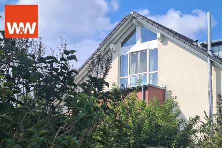 Hausansicht I - Wohnung kaufen in Zorneding - Dachgeschosstraum mit Südbalkon in zentraler Lage von Zorneding