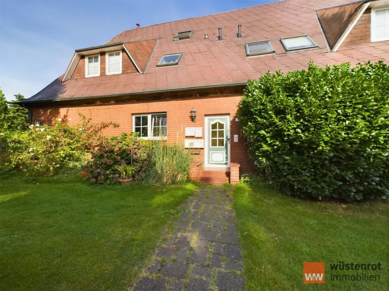 Ansicht - Wohnung kaufen in Elmenhorst - Schöne ETW im alten Bauernhaus