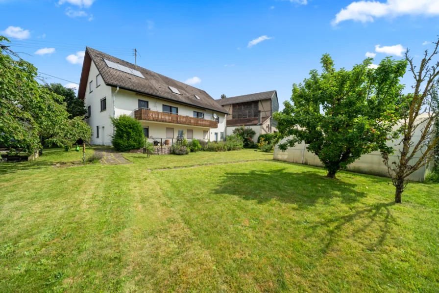 Garten - Haus kaufen in Neuried / Schutterzell - Ein Haus, drei Wohnungen! Wohnen Sie in der grünen Idylle mitten im Ried!