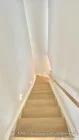 Treppe mit Wandstrahlern