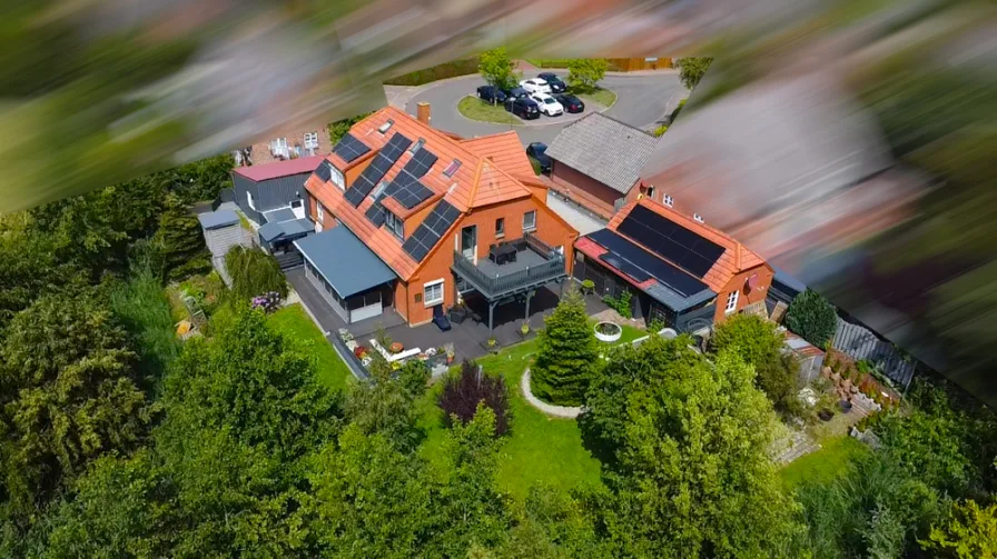Luftbild Rückansicht - Haus kaufen in Garding - Gepflegtes Wohnhaus mit drei Ferienwohnungen in Sackgassenlage