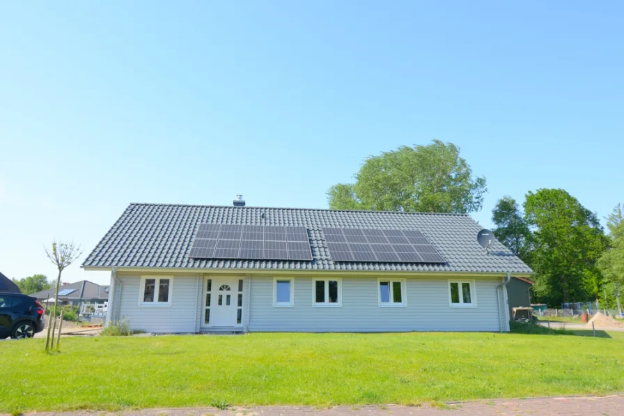 Außenansicht - Haus kaufen in Krempel - -Provisionsfrei- Moderner Bungalow mit großem Grundstück und Erweiterungsoption