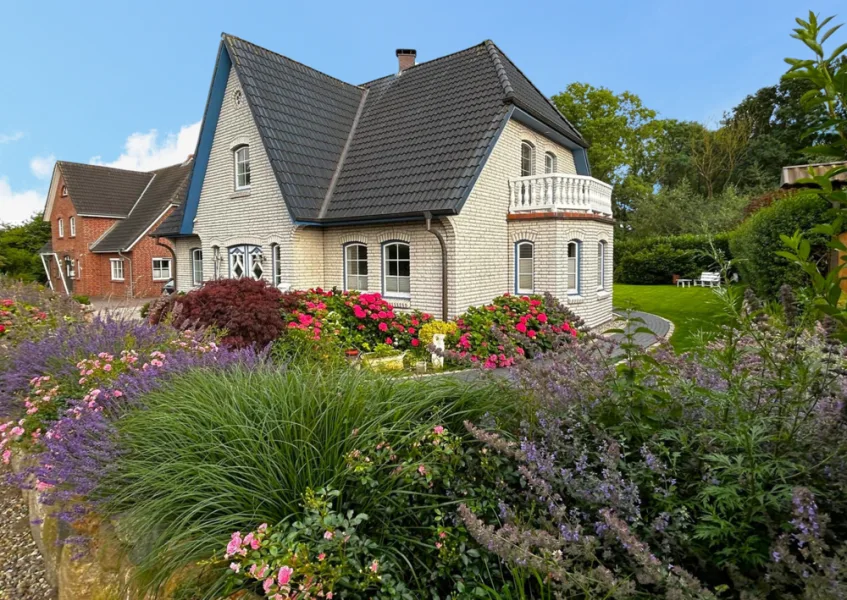 Außenansicht - Haus kaufen in Pahlen - Gepflegtes Einfamilienhaus am Park unweit der Eider in Pahlen