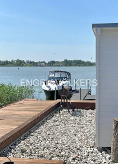 Blick auf das Achterwasser - Haus kaufen in Neppermin - Exklusives Bootshaus mit Wasserzugang und Bootsanleger in beliebter Lage