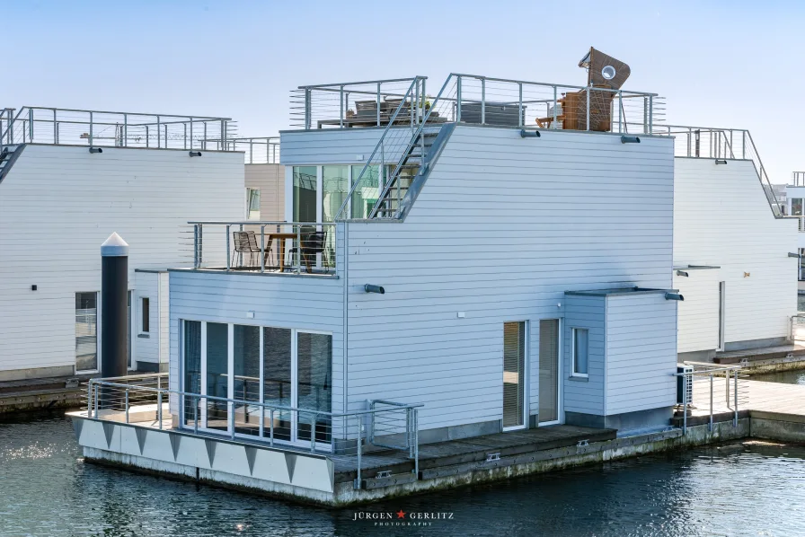  - Haus kaufen in Kappeln - Ferienhaus auf dem Wasser -                                 Das eigene Boot direkt am Haus