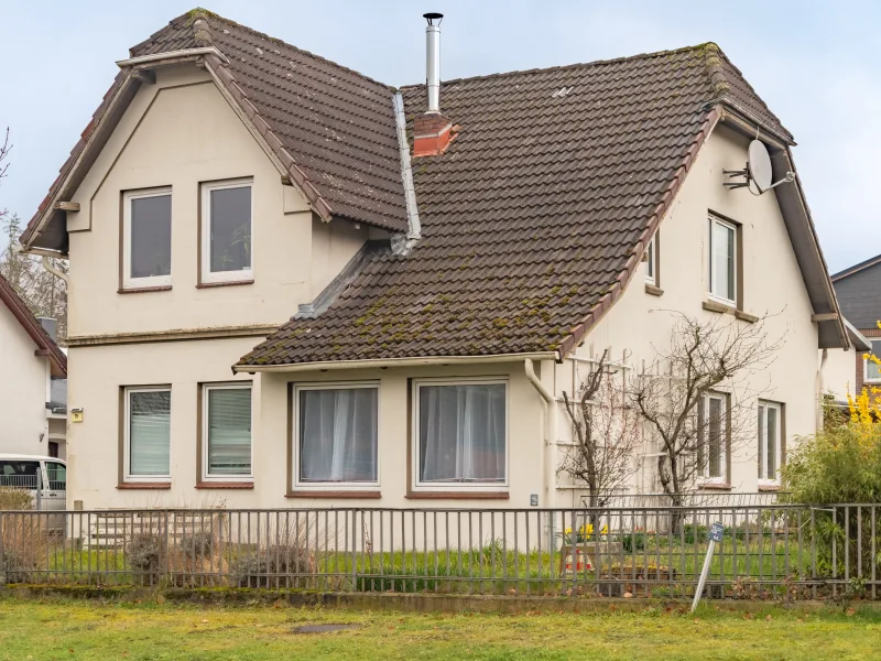 Außenansicht - Haus kaufen in Rickling - Charmantes Zweifamilienhaus mit vielseitigem Potenzial