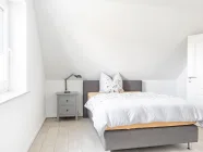 Schlafzimmer mit Ankleidezimmer