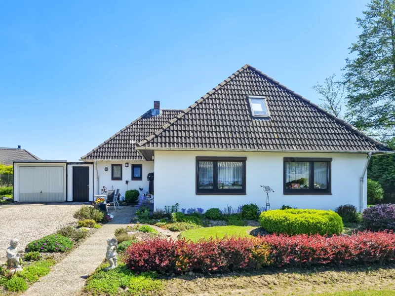  - Haus kaufen in Tönning | OT Kating - Gepflegter Bungalow mit viel Platz im Grünen