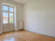 Gästezimmer mit Zutritt zum Balkon