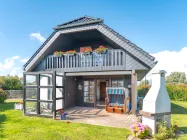 Terrasse mit festem Windschutz