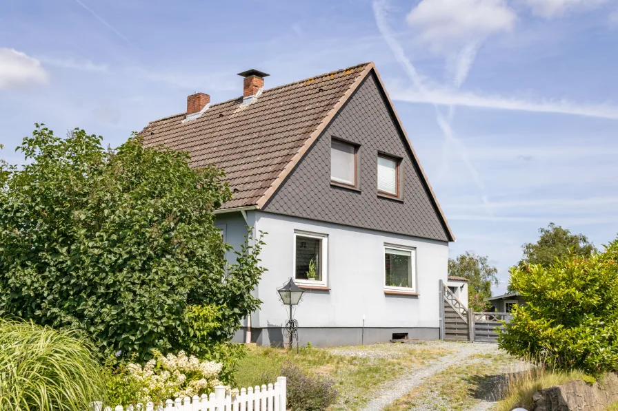  - Haus kaufen in Nübel - Teilsaniertes Einfamilienhaus in ruhiger Lage mit Vollkeller