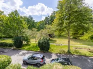 Blick vom Balkon in den Hermann Hesse Park