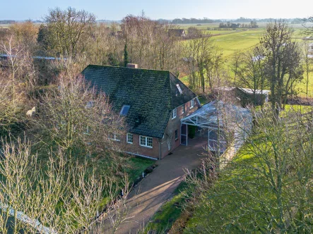  - Haus kaufen in Tetenbüll - Großzügige Doppelhaushälfte mit Weitblick                                                         in die Eiderstedter Marsch