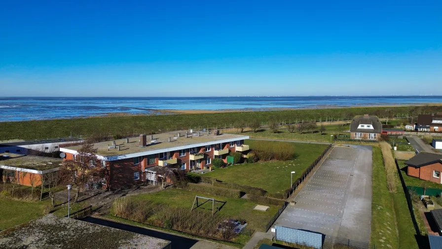  - Wohnung kaufen in Friedrichskoog (Spitze) - Nordseeidyll: Charmante Ferienwohnung direkt am Deich in Friedrichskoog-Spitze