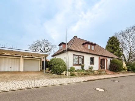  - Haus kaufen in Bremervörde - Charmantes Einfamilienhaus mit Gewerbefläche & Garten in Bremervörde