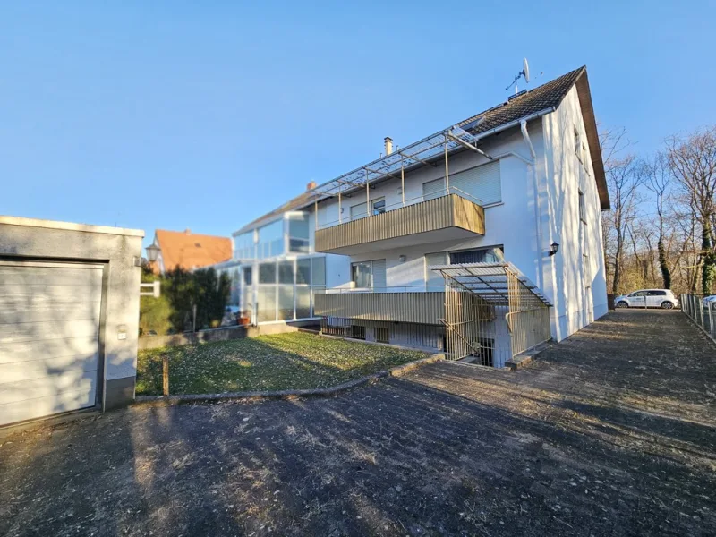 Fassadenansicht - Haus kaufen in Mannheim-Gartenstadt - RESERVIERT: Dreifamilienhaus in beliebter Waldrandlage Gartenstadts!