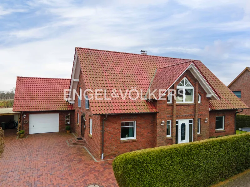 - Haus kaufen in Aurich - Dreigiebelhaus mit Garage in Sandhorst!