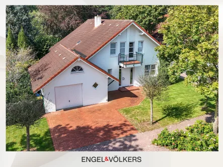  - Haus kaufen in Papenburg - Charmantes Einfamilienhaus mit Garage, Loggia und sonnigem Garten