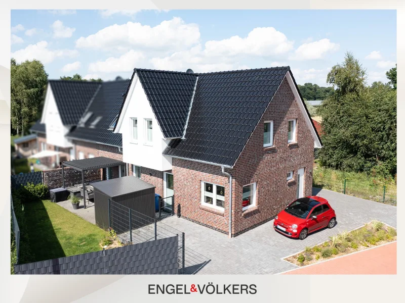  - Haus kaufen in Emden - Exklusive Doppelhaushälfte: 147 m² Wohnfläche auf pflegeleichtem Grundstück