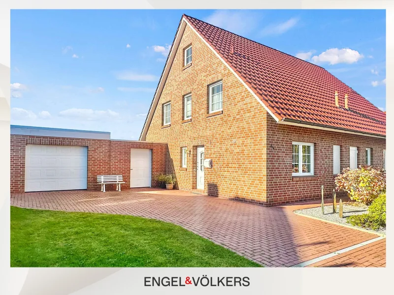  - Haus kaufen in Norden - Doppelhaushälfte Nähe Norddeich – Mit Kamin, Garage und Südwest-Terrasse