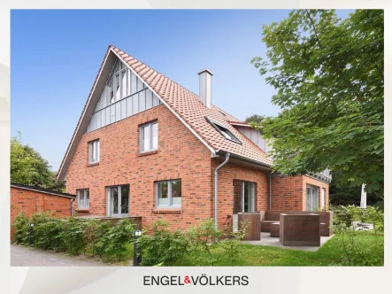  - Haus kaufen in Langeoog - Stilvolles, modernes Reihenendhaus mit Garten in idyllischer Lage