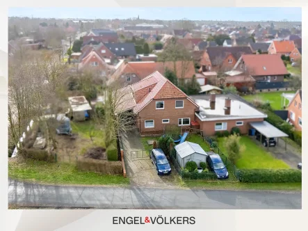  - Haus kaufen in Südbrookmerland - Zweifamilien-Option: Großzügiges Haus mit Garage in ruhiger Lage