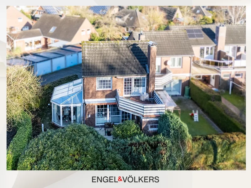  - Haus kaufen in Aurich - Charmantes Reihenendhaus mit Wintergarten und Parkblick in Aurich-Haxtum