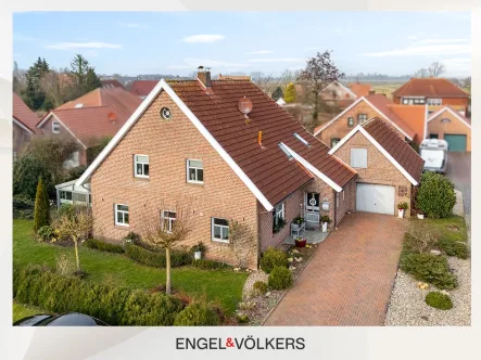  - Haus kaufen in Bunde - Großzügiges Einfamilienhaus mit separatem Wohnbereich & Wintergarten