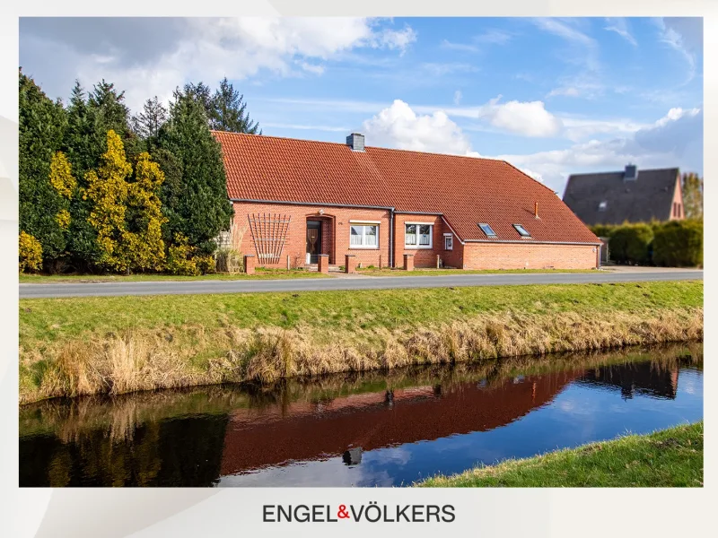  - Haus kaufen in Jheringsfehn - Fehnhaus an der Wieke – Zweifamilienhaus mit Modernisierungen und Potenzial