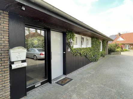 Hauseingang - Haus kaufen in Thuine - Winkelbungalow als Kapitalanlage - Inmitten von Thuine