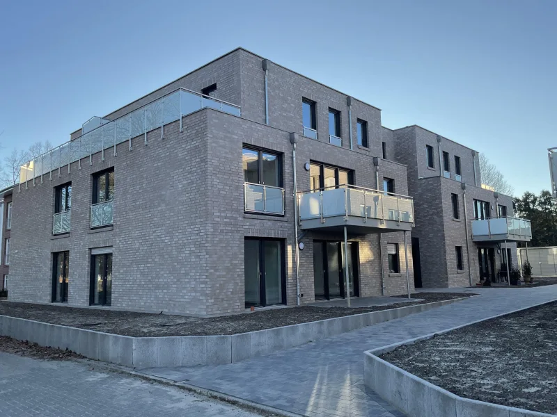 Außenansicht - Wohnung kaufen in Badbergen - OG-Wohnung im KFW 40 EE Standard zum Top-Preis im Zentrum der Gemeinde Badbergen
