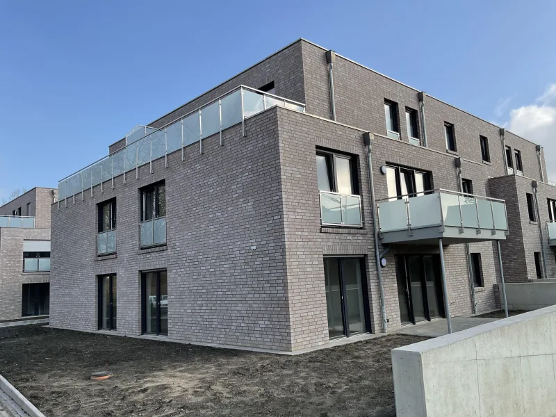 Außenansicht - Wohnung kaufen in Badbergen - OG-Wohnung im KFW 40EE Standard zum Top-Preis im Zentrum der Gemeinde Badbergen