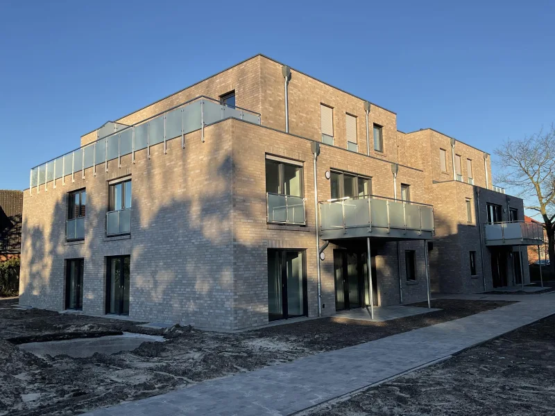 Außenansicht - Wohnung kaufen in Badbergen - OG-Wohnung im KFW 40EE Standard zum Top-Preis im Zentrum der Gemeinde Badbergen