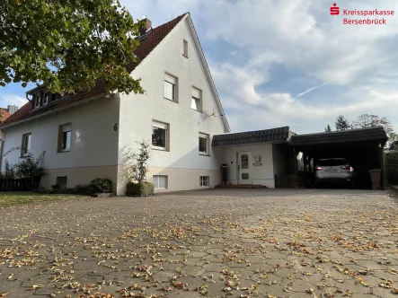 Westansicht - Haus kaufen in Quakenbrück - Charmante Doppelhaushälfte in Quakenbrück 