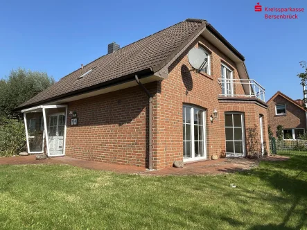 Südansicht - Haus kaufen in Bramsche - Altersgerechtes Einfamilienhaus mit Garten in Hesepe