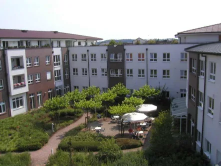 Innenhof - Wohnung kaufen in Melle - Wohnresidenz "Grönegau" ! Service Wohnen für Senioren in Melle-Mitte!