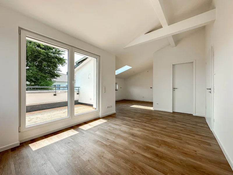 Wohnzimmer - Wohnung kaufen in Horneburg - Dachgeschosswohnung mit offener Balkenlage in toller Lage von Horneburg
