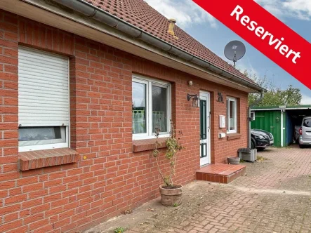 Außenansicht - Haus kaufen in Oldendorf - Reserviert Doppelhaushälfte mit Carport in Oldendorf