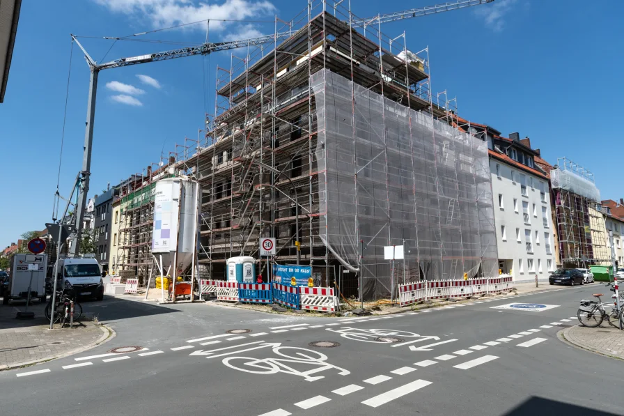 Außenansicht - Wohnung kaufen in Osnabrück - Neubauwohnung mit Blick in den Innenhof in der vorderen Wüste