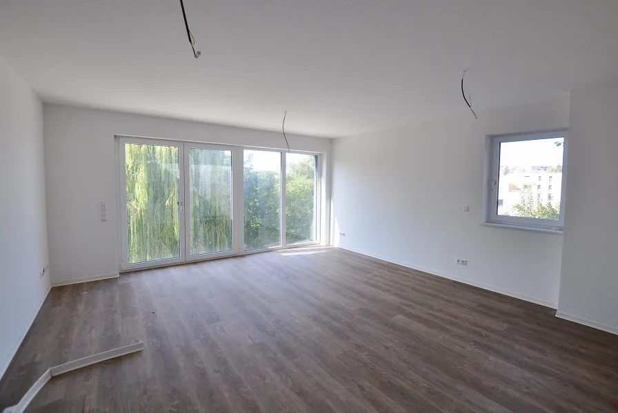 Wohnbereich - Wohnung kaufen in Stuttgart - Exklusive 2-Zimmer Wohnung mit 90 qm Garten