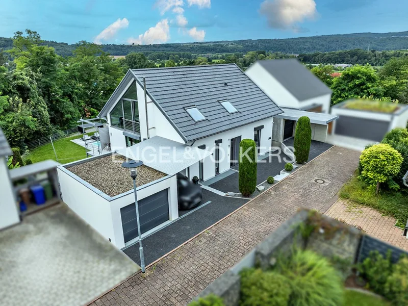 Anwesen mit 2 Garagen und 2 Stellplätzen - Haus kaufen in Mauer - Architektenhaus der besonderen Klasse in Top Lage