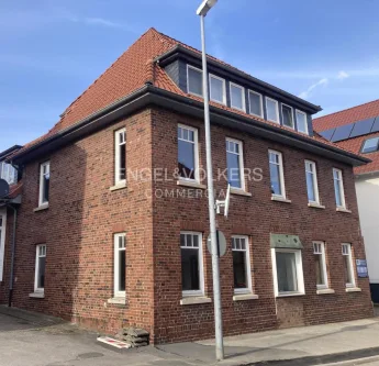 Außenansicht - Zinshaus/Renditeobjekt kaufen in Gehrden - Wohn- und Geschäftshaus 