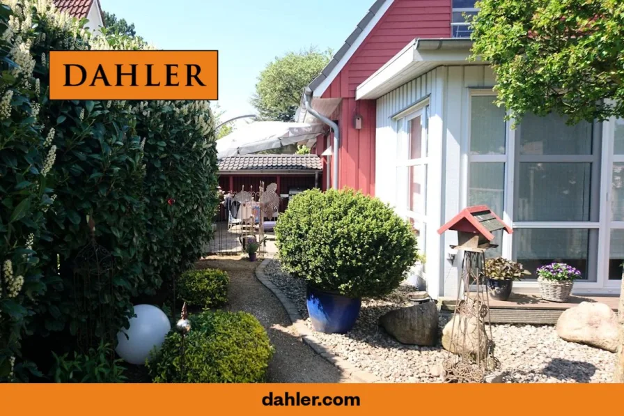 Rückansicht mit Garten und Terrasse - Haus kaufen in Wyk auf Föhr - Äußerst gepflegte Doppelhaushälfte mit kurzen Wegen ins Stadtzentrum und zum Strand