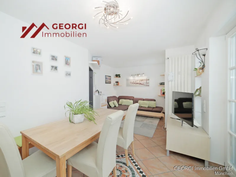 Wohn-/Essbereich - Wohnung kaufen in Grasbrunn - Sonnige Gartenwohnung über drei Etagen