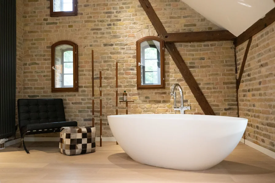 Freestanding bathtub in master bedroom